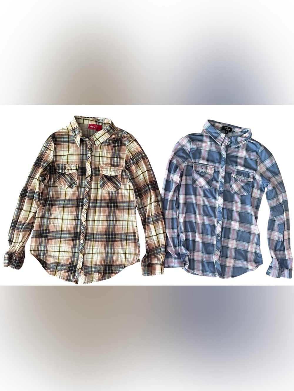 Two plaid button up long sleeve shirts size Med & Large